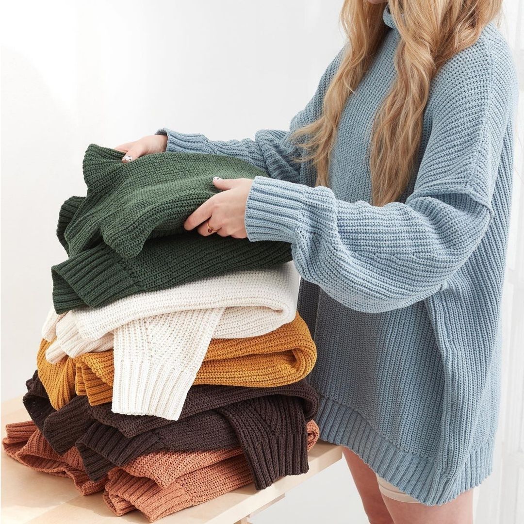 Stack of knit sweaters
